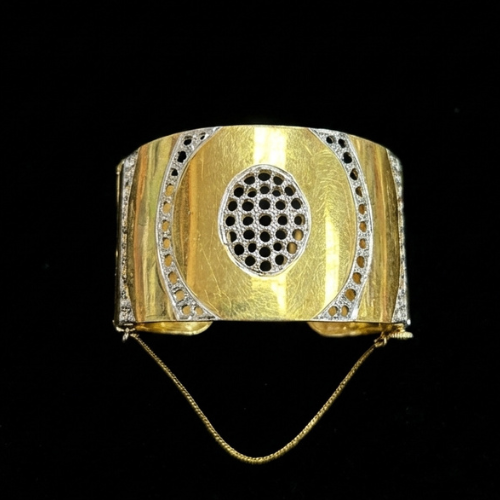 Gold and diamond cuff bracelet purchased for $2,275